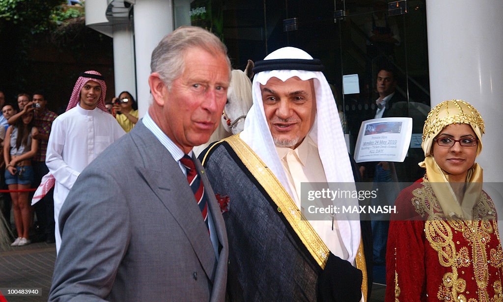 Britain's Prince Charles (L) flanked by