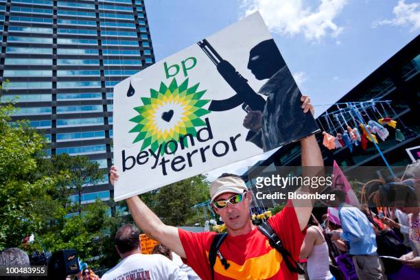 Code Pink activists take part in a demonstration outside the U.S. Headquarters of BP Plc in Houston, Texas, U.S., on Monday, May 24, 2010. BP Plc...