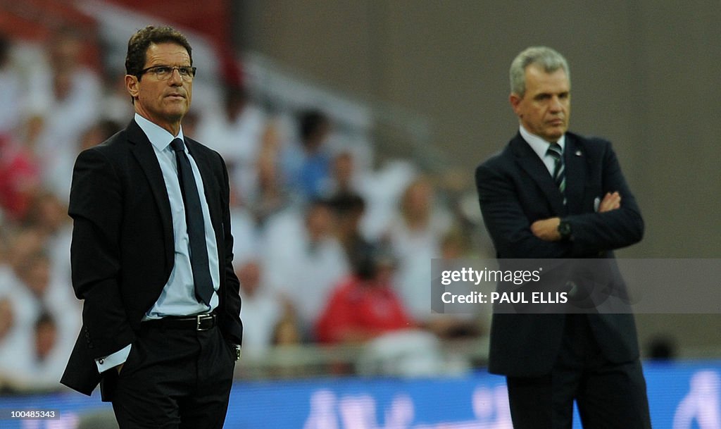 England's coach Fabio Capello (L) and Me