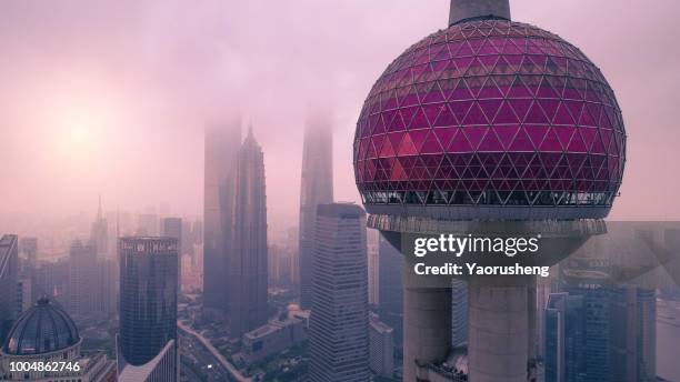 oriental pearl tower in shanghai china - east stock pictures, royalty-free photos & images