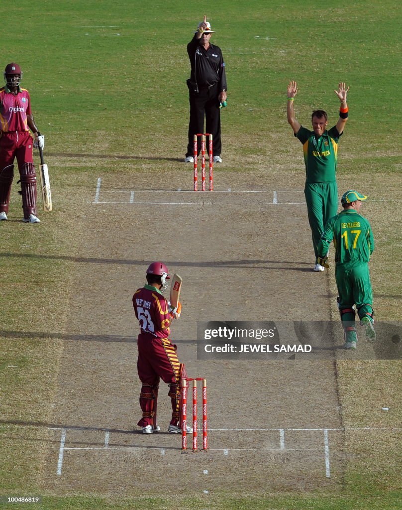 South African cricketer Johan Botha (R-t