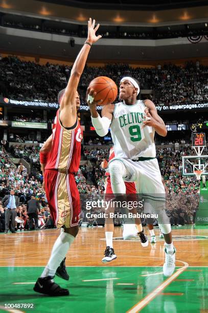 Rajon Rondo of the Boston Celtics lays the ball up over Jamario Moon of the Cleveland Cavaliers in Game Six of the Eastern Conference Semifnals...