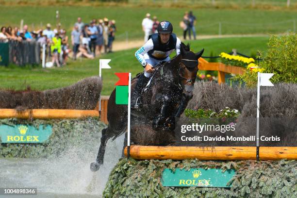 Christopher Burton of Australia riding Quality Purdey, during the obstacle in the water of the Cross Country test DHL-Prize in the park of the CHIO...