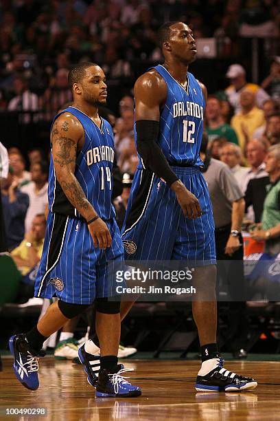 Jameer Nelson and Dwight Howard of the Orlando Magic walk towards the bench against the Boston Celtics in Game Four of the Eastern Conference Finals...