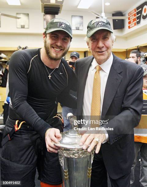 Mike Richards of the Philadelphia Flyers and Flyers Chairman Ed Snider pose with the Prince of Wales Trophy after defeating the Montreal Canadiens...