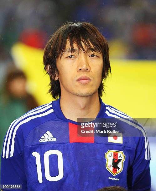 Shunsuke Nakamura of Japan lines up for the national anthems before the international friendly match between Japan and South Korea at Saitama Stadium...