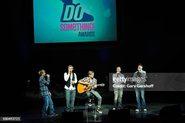 The pop band Backstreet Boys performs live on stage at DoSomething.org's celebration of the 2010 Do Something Award nominees at The Apollo Theater on...