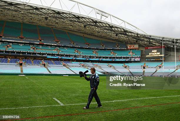 Craig Bellamy, coach of the NSW Blues, walks out onto the field during a NSW Blues training session ahead of tomorrow's State Of Origin Game I at ANZ...