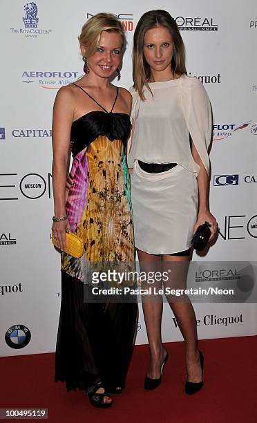 Anna Andronova and Maria Nevskaya arrive at the NEON Charity Gala in aid of the IRIS Foundation at the Capital City on May 24, 2010 in Moscow, Russia.