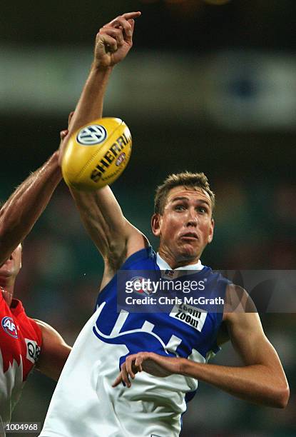 Matthew Burton of the Kangaroos in action during the round 4 AFL match between the Sydney Swans and the Kangaroos held at the Sydney Cricket Ground,...