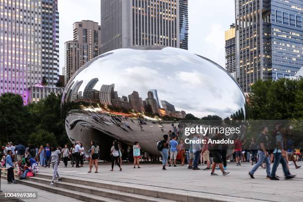 View of the Cloud Gate in Chicago, United States on July 24, 2018. The sculpture is nicknamed The Bean because of its shape. Made up of 168 stainless...