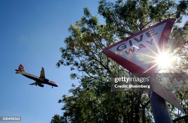 British Airways aircraft comes into land at Heathrow airport in London, U.K., on Monday, May 24, 2010. British Airways Plc scrapped flights for about...