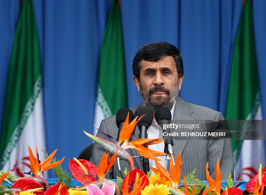 Iranian President Mahmoud Ahmadinejad gr