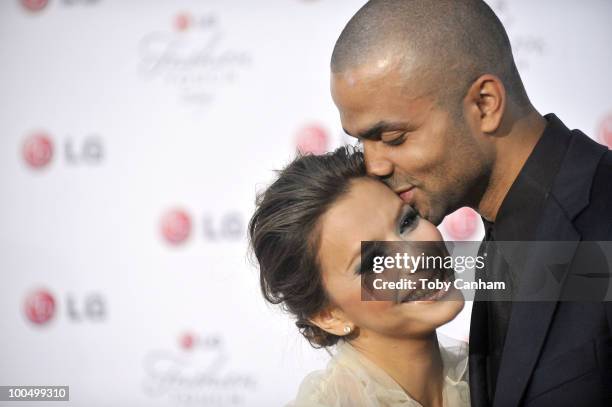 Eva Longoria Parker and Tony Parker pose for a picture at the Victoria Beckham and Eva Longoria Parker Night of Fashion & Technology with LG Phones...