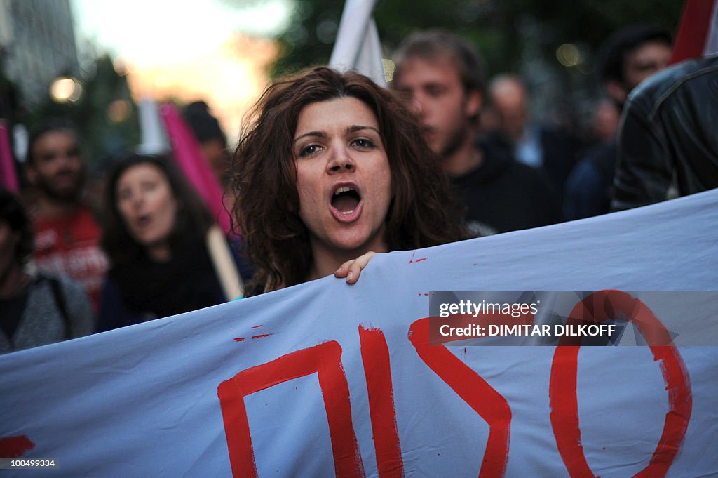 Leftist protesters shout anti-government