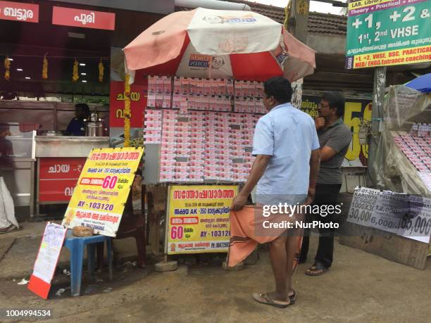 Man selling lottery tickets in the city of Thiruvananthapuram , Kerala, India.