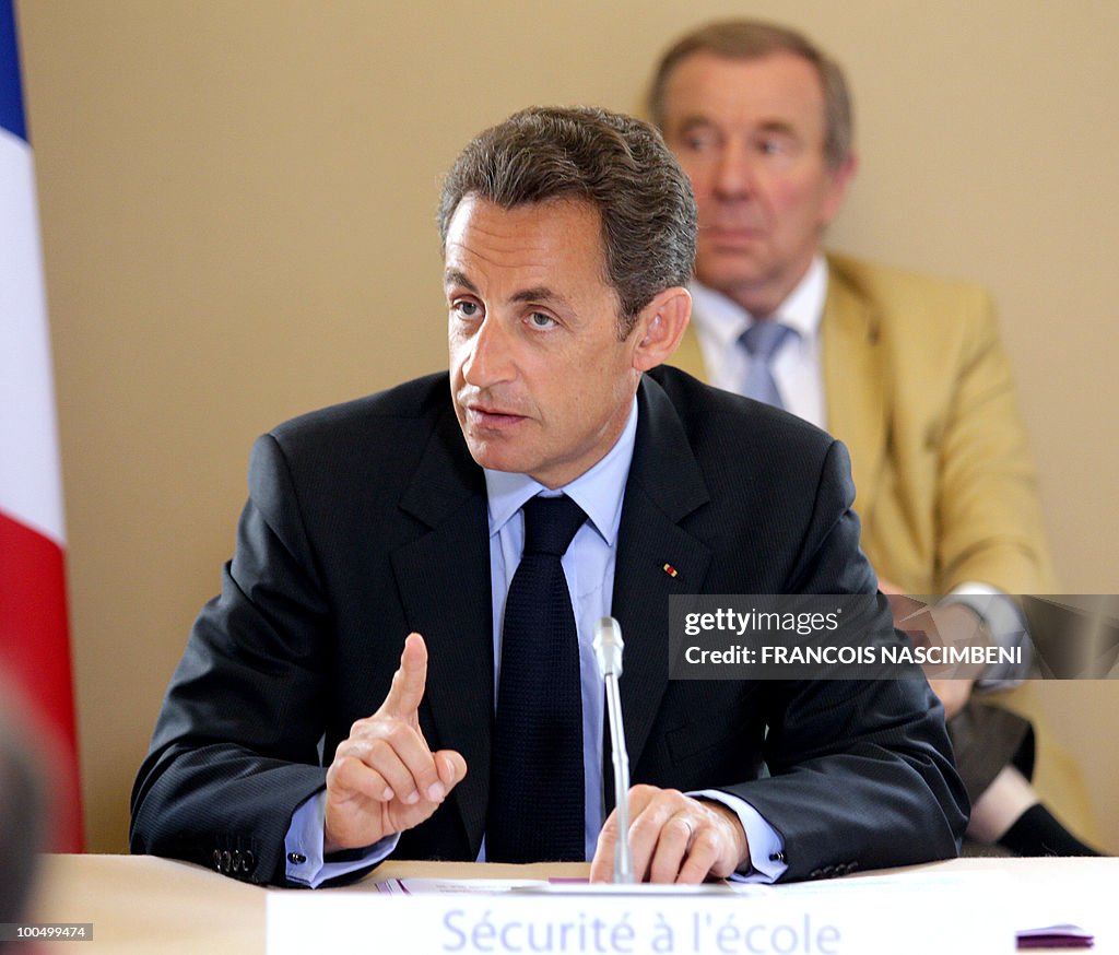 French President Nicolas Sarkozy takes p