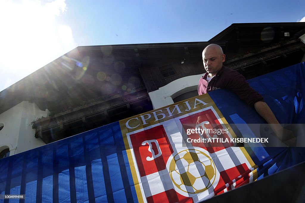 A local worker sets the Serbian national