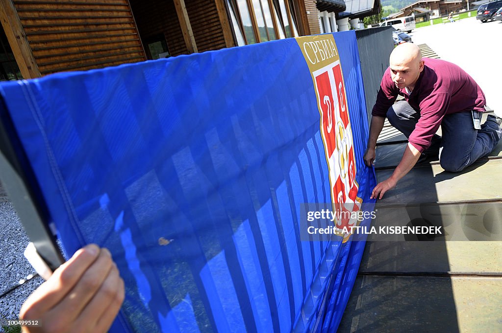 A local worker sets the Serbian national