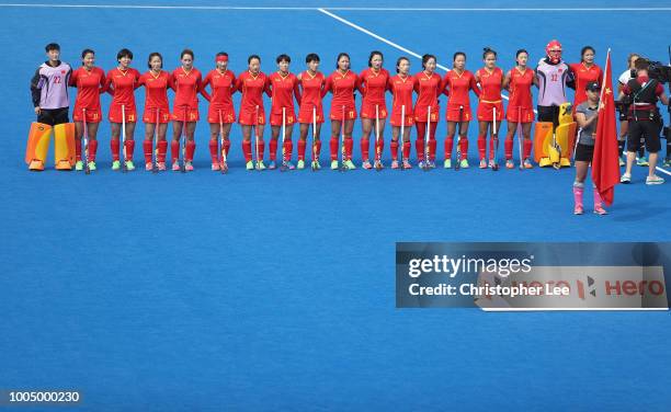 The China team stand for their National Anthem during the Pool A game between China and Italy of the FIH Womens Hockey World Cup at Lee Valley Hockey...