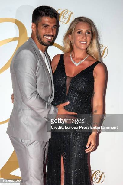 Luis Suarez and his wife Sofia Balbi attend Cesc Fabregas and Daniella Semaan's wedding party on July 24, 2018 in Ibiza, Spain.