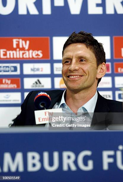 Bastian Reinhardt smiles during a press conference presenting new head coach Armin Veh and the new sport director Bastian Reinhardt of Hamburger SV...