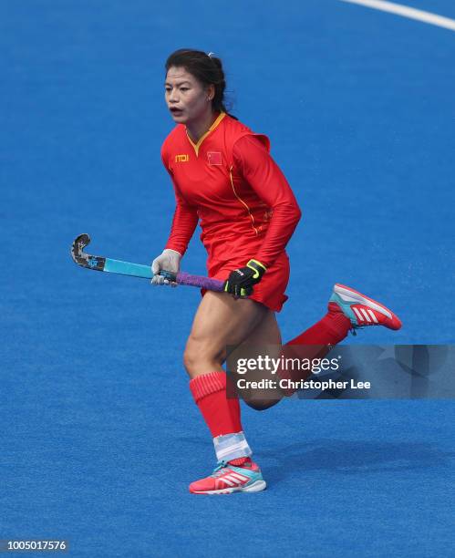 Bingfeng Gu of China in action during the Pool A game between China and Italy of the FIH Womens Hockey World Cup at Lee Valley Hockey and Tennis...