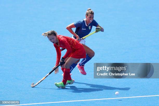 Marcela Casale of Italy gets past Wenyu Xu of China during the Pool A game between China and Italy of the FIH Womens Hockey World Cup at Lee Valley...