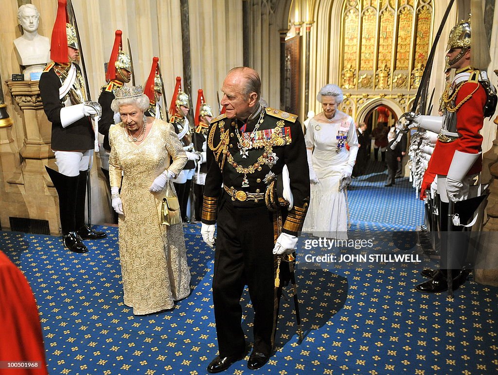 Britain's Queen Elizabeth II (L) accompa