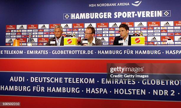 Head coach Armin Veh, press officer Konstantin Krueger and sport director Bastian Reinhardt attend during a press conference to present the new head...