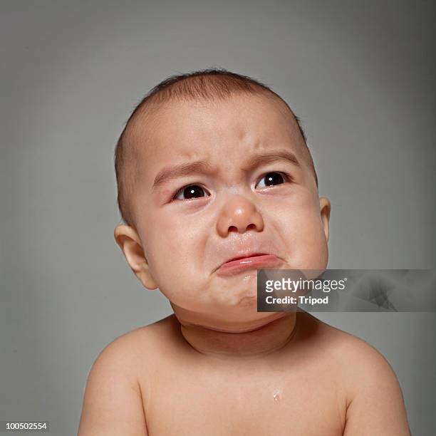 baby boy (6-9 months) crying, close-up - baby stockfoto's en -beelden