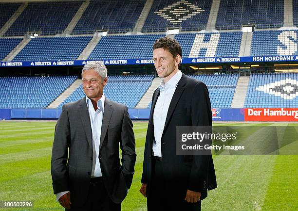 Head coach Armin Veh and sport director Bastian Reinhardt pose after the press conference to present the new head coach Armin Veh and the new sport...
