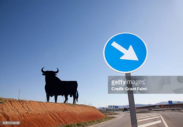 bull billboards near highway - bull billboard spain stock pictures, royalty-free photos & images