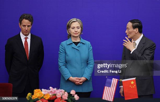 Secretary of State Hillary Clinton , U.S. Treasury Secretary Timothy Geithner and China's Vice Premier Wang Qishan attend a press conference during...