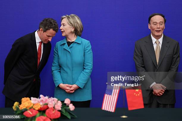 Secretary of State Hillary Clinton , U.S. Treasury Secretary Timothy Geithner and China's Vice Premier Wang Qishan attend a press conference during...