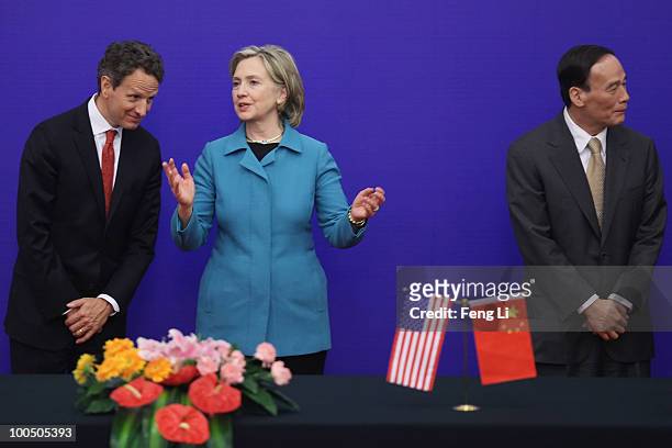 Secretary of State Hillary Clinton , U.S. Treasury Secretary Timothy Geithner and China's Vice Premier Wang Qishan attend a press conference during...