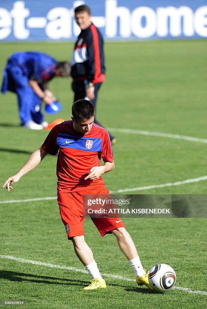Serbian Nemanja Tomic passes the ball in