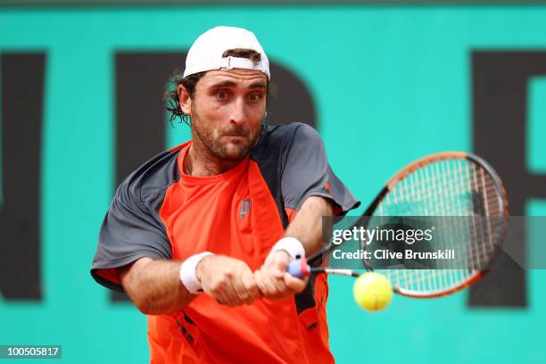 Santiago Ventura of Spain plays a backhand during the men's singles first round match between Santiago Ventura of Spain and Andreas Seppi of Italy on...