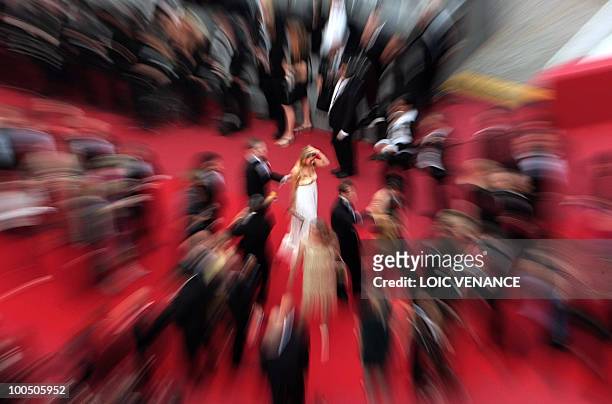 Guest arrive for the closing ceremony at the 63rd Cannes Film Festival on May 23, 2010 in Cannes. AFP PHOTO / LOIC VENANCE