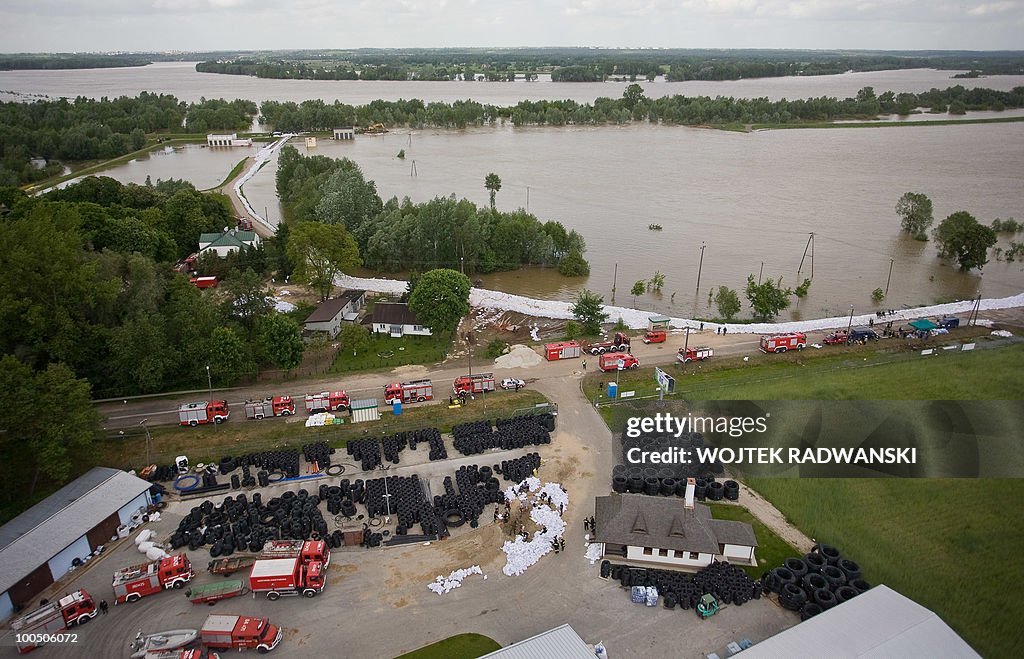 Polish firemen fight the flood  in Dobrz