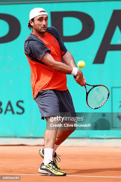 Santiago Ventura of Spain plays a backhand during the men's singles first round match between Santiago Ventura of Spain and Andreas Seppi of Italy on...