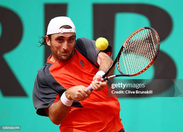 Santiago Ventura of Spain plays a backhand during the men's singles first round match between Santiago Ventura of Spain and Andreas Seppi of Italy on...