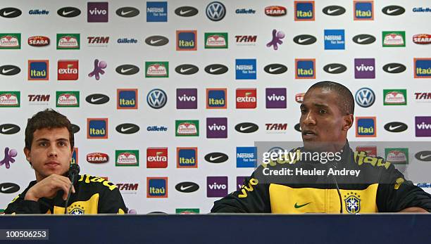 Striker Nilmar and left-back Gilberto , of Brazil National Soccer Team, during a press conference at Caju Training Center on May 25, 2010 in...