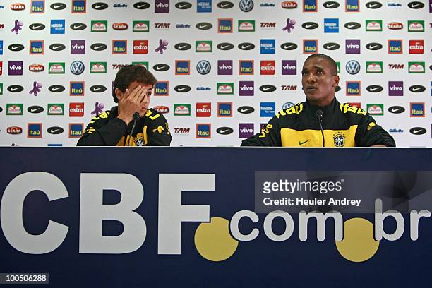 Striker Nilmar and left-back Gilberto , of Brazil National Soccer Team, during a press conference at Caju Training Center on May 25, 2010 in...