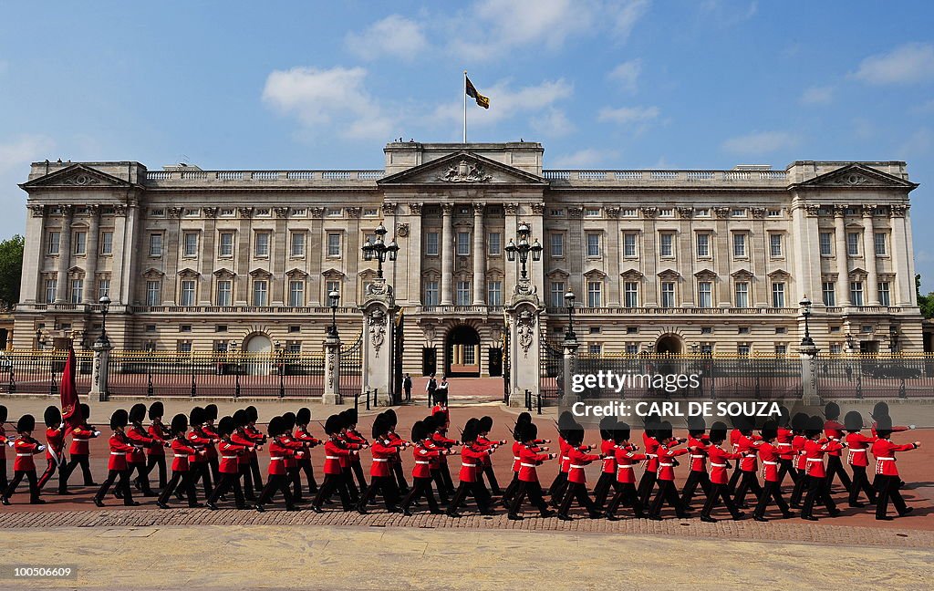 The Queen's Guard march in front of Buck