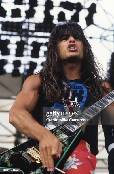 Dan Spitz of heavy metal band Anthrax performs on stage at the Monsters of Rock Festival held at Donington Park on August 22, 1987.