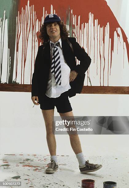 Guitarist Angus Young of Australian rock band AC/DC poses in London, England in August 1979.