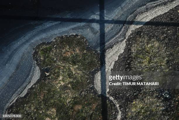 This picture taken on July 24 shows waste water at the Mitra Citarum Air Biru wastewater processing plant along the Citarum river in Bandung, after...