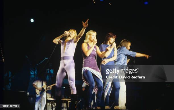 Bjorn Ulvaeus, Agnetha Faltskog, Anni-Frid Lyngstad and Benny Andersson of Swedish pop group Abba perform on stage at Wembley Arena in London,...