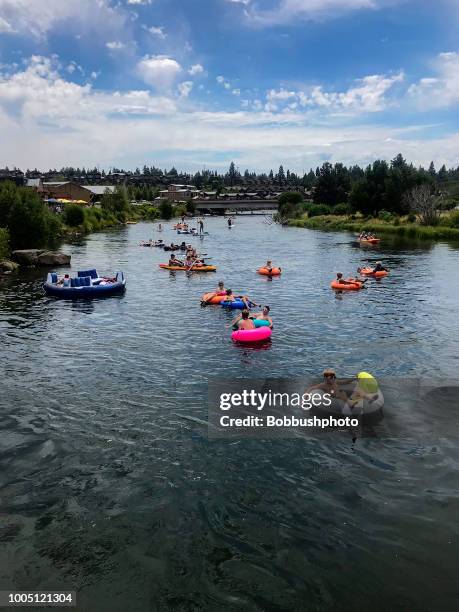 floating down the deschutes river in bend, oregon - bend oregon stock pictures, royalty-free photos & images